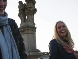 two women walking along and looking at the camera Stock Footage