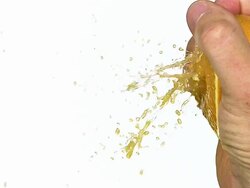 MS SLO MO Hand of man squeezing orange / Vieux Pont, Normandy,  France Stock Footage