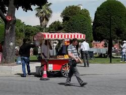 CORN SELLER AND RED CART Stock Footage