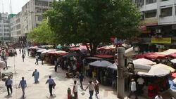 A CCTV camera overlooks the busy Nehru Place market, New Delhi, India Stock Footage
