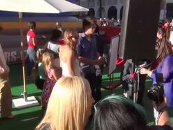 Peyton List greets fans with kids at the Planes Mo Stock Footage