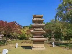 Shot of Hongjedong samcheungseoktap stone pagoda(Korea Treasure 166) at the National Museum of Korea Stock Footage