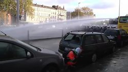 Protesters marching through Brussels clashed with police on Thursday as they demonstrated against government policies that will extend the pension age, contain wages and cut into public services. (Nov. 6) News Clip