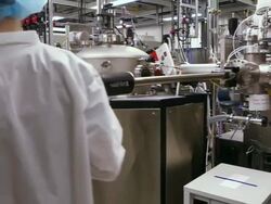 MS PAN Two technicians walking in laboratory (Research and development of solar energy conversion materials) / Ann Arbor, Michigan, United States  Stock Footage