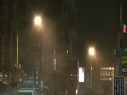 Rain lashing in street lights; Typhoon, Morakot, Taiwan 7th August 2009 (With Audio) Stock Footage