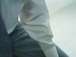 HD CRANE: Engineer kneeling before blueprints Stock Footage