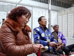 MS Folk artists of chinese shadow play troupe playing accompaniment with traditional music instrument during chinese spring festival  AUDIO  / xi'an, shaanxi, china Stock Footage
