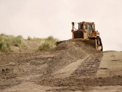 Bulldozer Pushing Sand Stock Footage