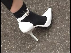 Women in high heels race for shopping cash prize News Clip