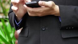 Businessman using mobile phone Stock Footage