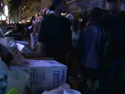 Medium Shot - Crowd of people in costumes walking down Bourbon Street at night / New Orleans Louisiana Stock Footage