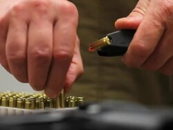 Loading handgun. Pistol and bullet. Stock Footage