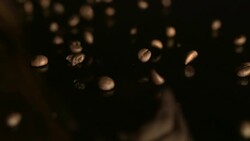 Falling coffee beans background. Stock Footage