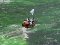 Chicago River Dyed Green In St. Patrick's Day Tradition Stock Footage