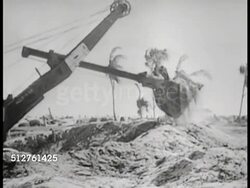 1943: BETIO, TARAWA: US NAVY SEEBEES WORKING: WS Crane digger moving sand. XWS Airstrip w/ steam roller packing dirt. MS Dump truck dumping sand on landing strip runway.  World War II. WWII. Instructional Video