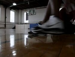 WS Young man playing basketball and practicing inside  gymnasium / Minneapolis, Minnesota, United States  Stock Footage