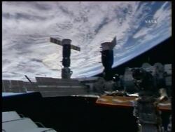 NASA says the computers controlling the space station are now 'stable;' and that a tear in the shuttle's thermal blanket has been repaired. News Clip