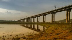 Rail bridge 'Pa Sak Jolasid Dam' on twilight time lapse Stock Footage