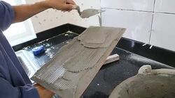 Installing Tiles wall. Stock Footage