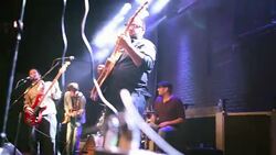 Music band performing on stage Stock Footage