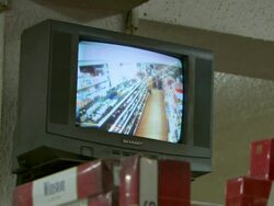 MS Shot of CCTV screen in local supermarket with changing views / Conakry, Guinea Stock Footage