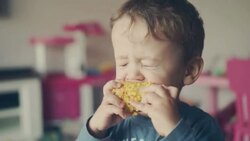 Little Kids Eating Corn on the Cob Stock Footage