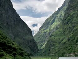 T/L cloud over Dharapani River, Himalayas Stock Footage