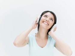 Woman listening to music Stock Footage