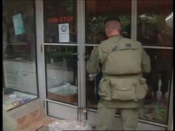 YUGOSLAVIA: KOSOVO: KFOR FAIL TO STOP PEOPLE LOOTING News Clip