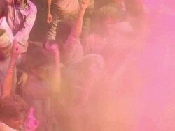 Group of people playing holi and dancing, Delhi, India Stock Footage