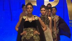 Bridal fashion and rich colours dominate catwalk shows News Clip