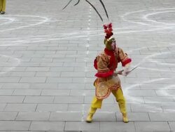 MS Chinese folk artist dresses as Monkey King to performing in Tang Paradise during chinese spring festival  AUDIO  / xi'an, shaanxi, china Stock Footage