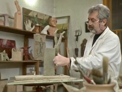 HD DOLLY: Sculpture Artist Making Clay Statue Stock Footage