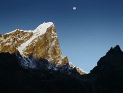 Time-lapse of the moon going behind Himalayan peaks in the morning. Stock Footage