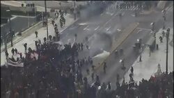 Fierce clashes between police and protesters; clean-up News Clip