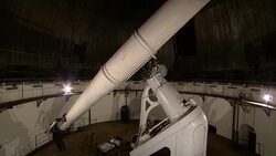 Moving a refracting telescope Stock Footage