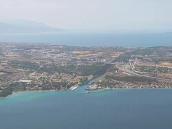 WS AERIAL View of corinth canal with city / Corinth, Peloponnese, Greece Stock Footage