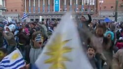 Jubilant Uruguay fans celebrate their team's first victory of the competion News Clip