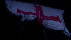 A red cross on a sail is being hoisted. Stock Footage