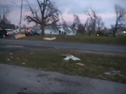 WS POV View of emergency vehicles arrive and damaged building moments after tornado / Woodward, Iowa, United States Stock Footage