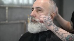 brutal barber clipper mows bearded adult senior hipster Stock Footage