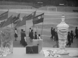 North Korean athletes and their fans enjoy soccer Stock Footage