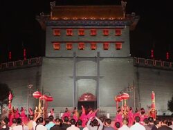 MS Ancient rituals to welcome the guests in front of city wall/xian,shaanxi,China Stock Footage