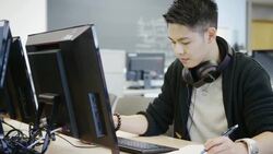 University student in a computer lab Stock Footage