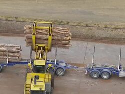 WS AERIAL TS Woods unloading from truck / Adelaide, Australia Stock Footage