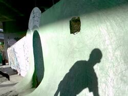 MS SLO MO Shot of skateboarder wall riding / Venice, California, United States  Stock Footage