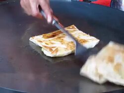 Roti cooking Stock Footage