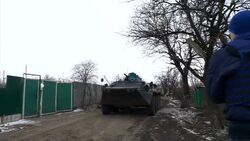 Pro Russian rebels in armoured troop carrier News Clip