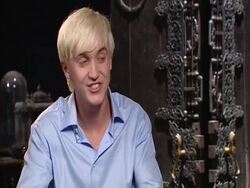 INTERVIEW Tom Felton on the difference between children's reactions meeting him and meeting Daniel, and Stock Footage