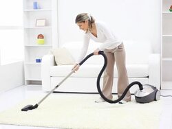 Housewife cleaning the room with vacuum cleaner. Stock Footage